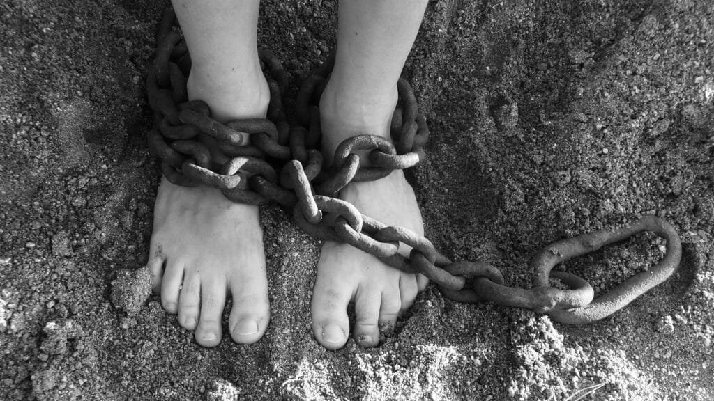 victim of human trafficking in chains